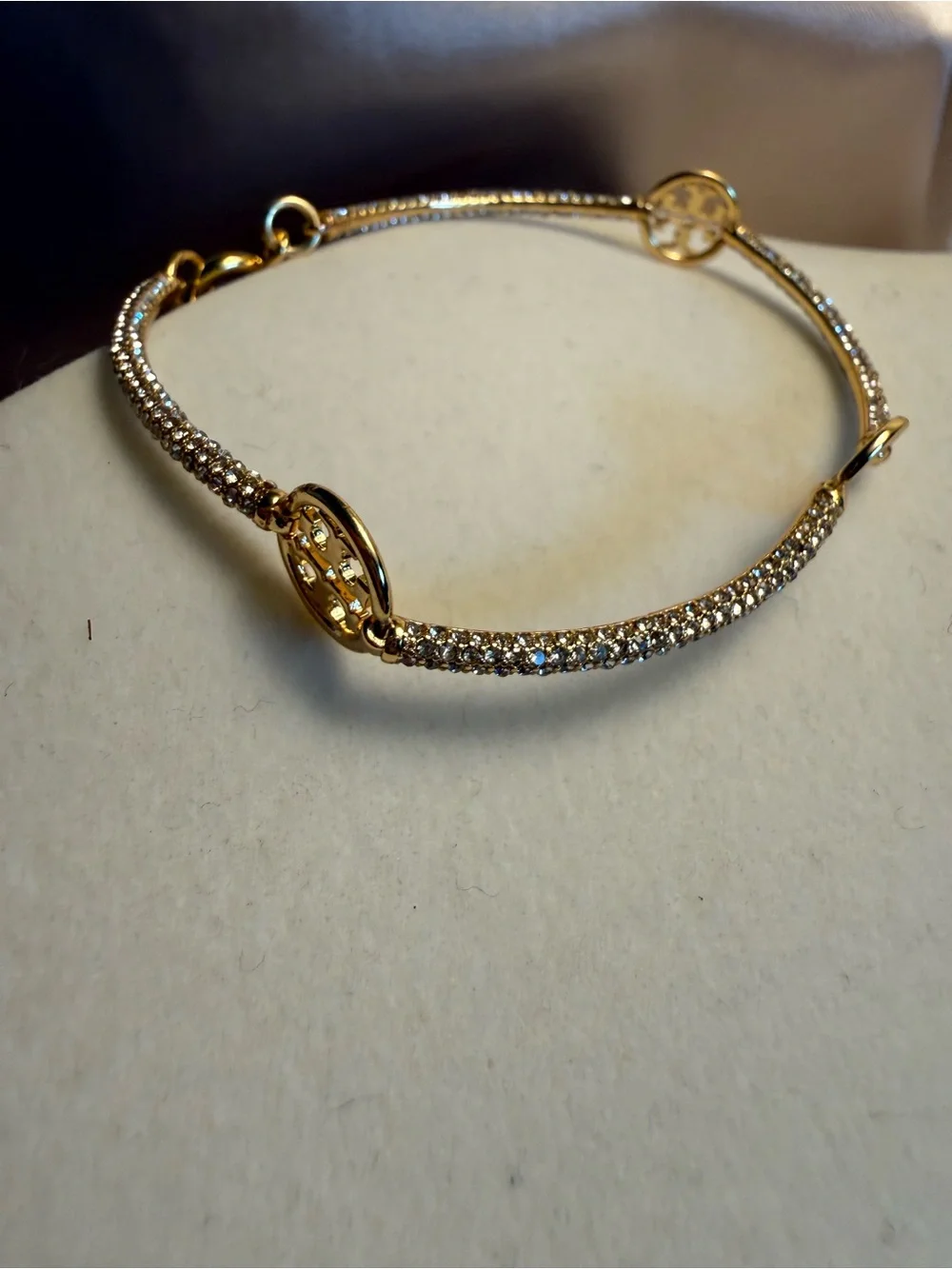 Gold Crystal Pavé Bangle Bracelet with Logo Discs